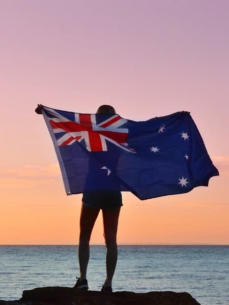 man holding Australia flag