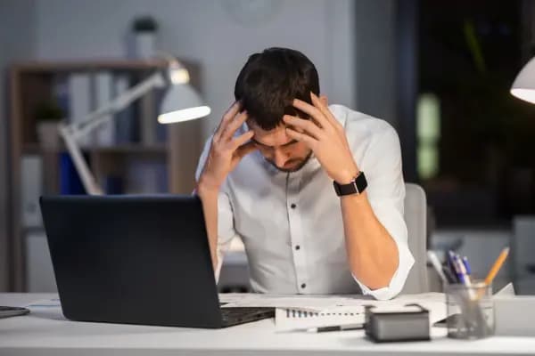 person clicking a computer mouse