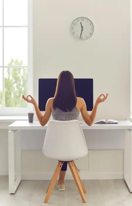 an empty office chair at a desk